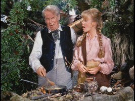 Maurice Chevalier and Hayley Mills sing "Enjoy It" together, one of four songs the Sherman Brothers wrote for the film.